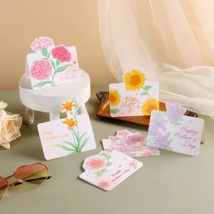 Detailed view of various floral Mother's Day greeting cards in a lifestyle setting