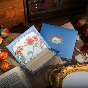 Kreative 3D-Pop-up-Glückwunschkarte mit Rosendesign und passendem blauem Briefumschlag