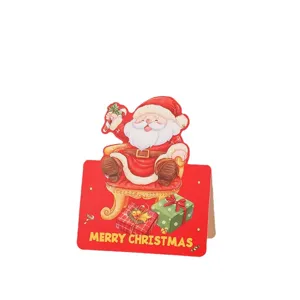 Vintage red Christmas greeting card with Santa Claus illustration and festive text
