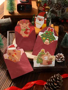 Cute cartoon Christmas cards set with red envelopes and festive holiday patterns