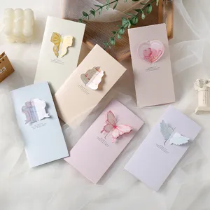 Set of elegant 3-fold pop-up greeting cards with artistic cutout designs for all occasions.