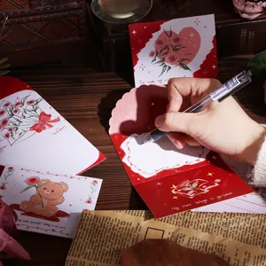 Close-up of vintage tri-fold bouquet greeting card showing handwritten message and detail