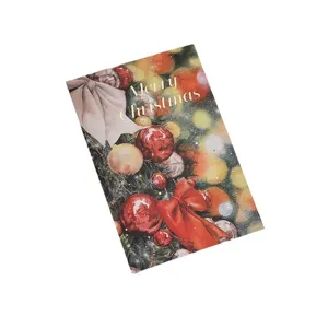 Elegant bronzing Merry Christmas greeting card with festive baubles and red bow