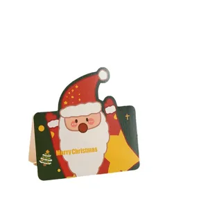 Cute Santa Claus Christmas greeting card with Merry Christmas message on white background.