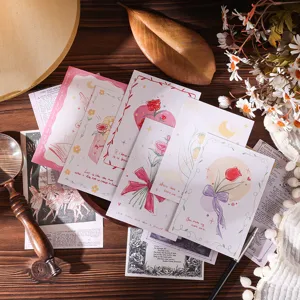 Close-up of artistic floral greeting cards with elegant illustrations and quotes.
