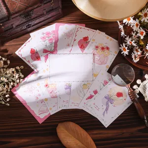 Vintage set of floral greeting cards with hand-drawn rose and tulip designs in a rustic setting