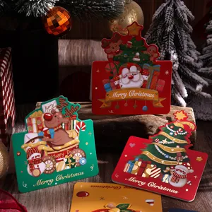 Primo piano dettagliato di biglietti augurali di Natale vintage con doratura a caldo