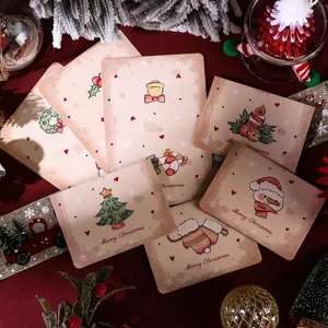 Detailed view of various vintage Christmas cards with cute cartoon illustrations.