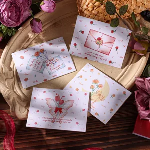 Detailed view of romantic Valentine's Day floral greeting cards with butterfly and rose designs