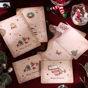 Detailed view of vintage Christmas cards with cute cartoon patterns and festive decor