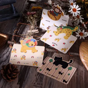 Detailansicht vintage Cartoon-Tier-Grußkarten mit Affe, Löwe und Leopard Designs.