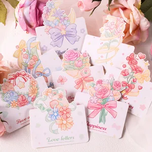 Vista detallada de tarjetas de felicitación con ramos de flores en tonos pastel románticos