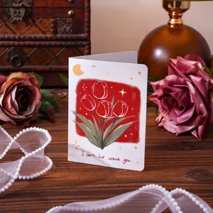 Detailed view of a vintage greeting card featuring a tulip bouquet and romantic message