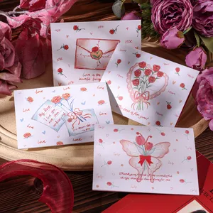 Close-up of elegant Valentine's Day floral greeting cards with English romantic quotes
