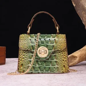 Detailed view of retro green crocodile pattern mini handbag with gold chain strap