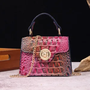 Detailed view of a retro handbag with vibrant multi-color crocodile skin texture and gold lock.