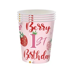 Detailed view of pink strawberry themed paper cups for baby girl first birthday party