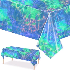 Close-up detail of iridescent ocean wave water ripple pattern plastic party tablecloth.