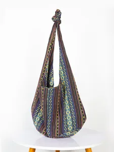 Bolso hobo retro con estampado jacquard azteca de algodón y lino con nudo.