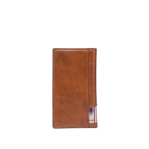 Vintage brown faux leather tall wallet with colorful bohemian woven fabric detail.