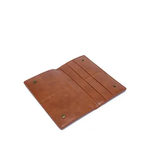Interior view of brown vintage long wallet with multiple card slots and snap closures