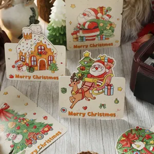 Sortierte Retro-Weihnachtskarten mit Illustrationen von Weihnachtsmann und Rentieren