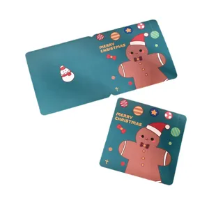 Festive square Christmas greeting card featuring a cute cartoon gingerbread man