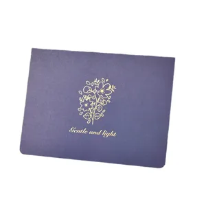 Elegant dark purple greeting card with gold-stamped floral pattern and text