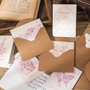 Vintage kraft paper postcards featuring floral illustrations and envelopes for greetings.