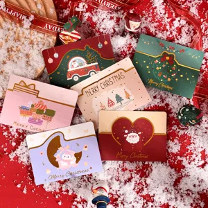 Set of assorted die-cut Christmas greeting cards with creative gold-foiled illustrations