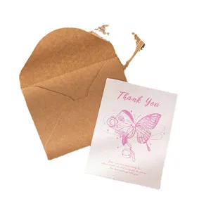Vintage kraft paper envelope set with a delicate pink butterfly thank you card