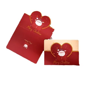 Creative die-cut Christmas greeting card with gold foil Santa Claus heart design
