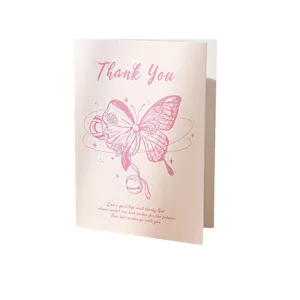 Elegant retro pink greeting card with butterfly bow design and Thank You script text