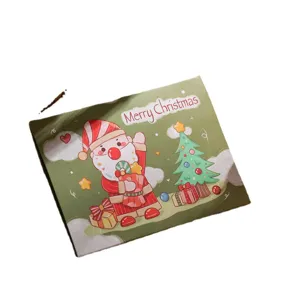 Trifold Christmas greeting card featuring cartoon Santa and tree on green background