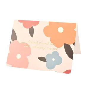 Tarjeta felicitación floral acuarela con texto dorado 'Best Wishes' para regalos y más