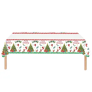 Close-up detail of watercolour Christmas tree pattern on disposable tablecloth