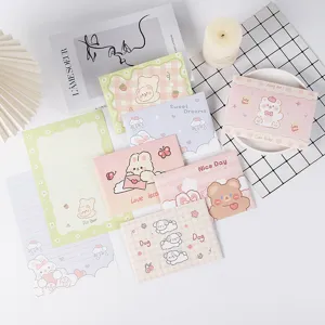Vue de dessus d'ensembles de lettres et enveloppes cartoon avec de douces illustrations de lapin
