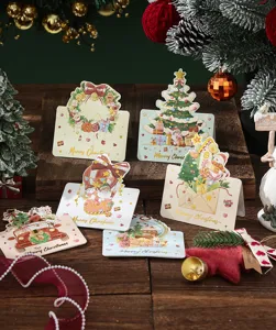 Six different gold-stamped Christmas greeting cards featuring festive holiday illustrations