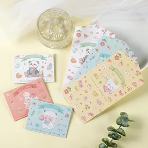 Vista detallada de lindas tarjetas de felicitación plegables con motivos de panda y oveja.
