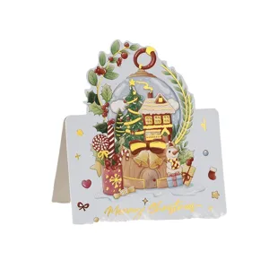 Elegant Christmas greeting card with gold foil "Merry Christmas" and winter scene.