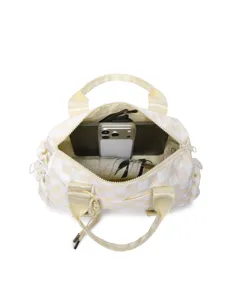 Top view of yellow checkerboard travel bag showing large internal capacity with props