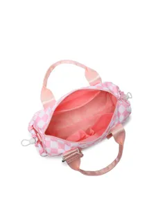 Interior view of pink checkered travel bag showing spacious compartments and inner pockets