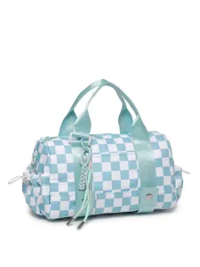 Close-up of a stylish blue and white checkered duffel bag for travel storage and organization
