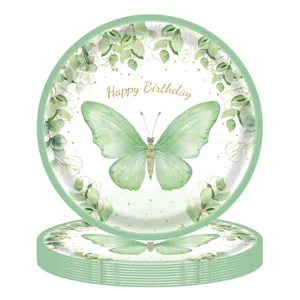 Détail d'assiettes en papier jetables avec motif papillon vert pour décoration de fête