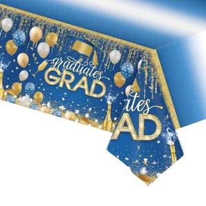 Nappe de remise des diplômes bleu et or avec ballons et motifs de chapeaux de diplômé.