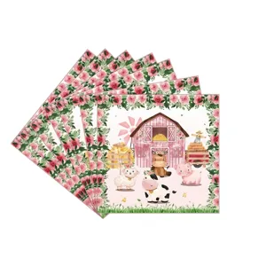 Détail de serviettes en papier rose thème animaux de la ferme avec bordure florale.
