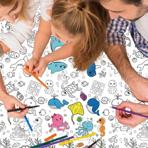 Detailed view of children and parents coloring a sea world themed paper tablecloth