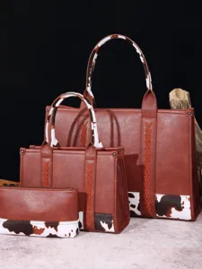 Juego de bolsos marrones estilo retro western con estampado de vaca