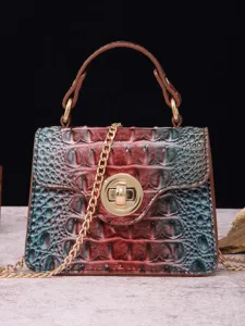 Vintage multi-colored crocodile embossed handbag with gold chain strap and rotary lock