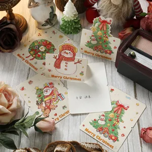 Vielfalt an Vintage-Weihnachtskarten mit wunderschönen handgezeichneten Motiven.